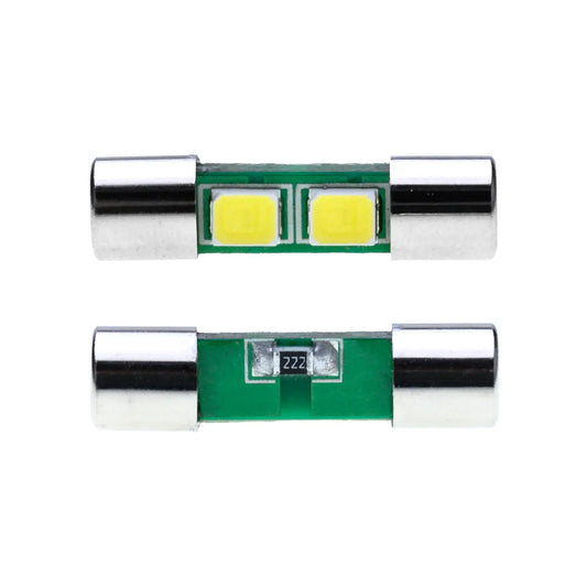 Two cylindrical LED fuse bulbs with metallic ends, shown front and back; one side displays dual yellow LED chips, the other side a small resistor component.