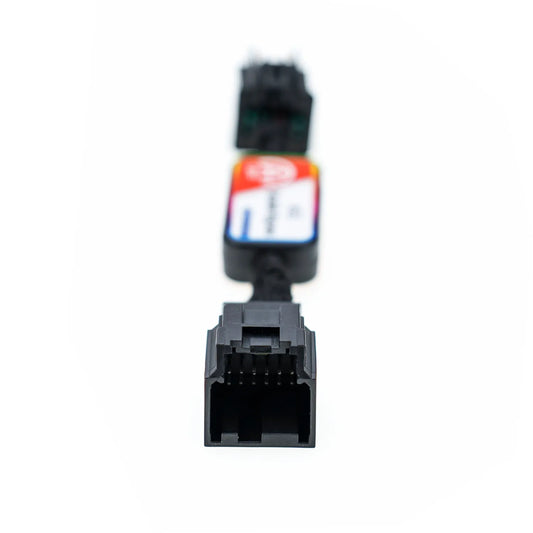 A black automotive bypass module labeled "ASS Disable Bypass" with "A OFF" indicator, featuring two connectors. There is a 12-pin male connector on one end.