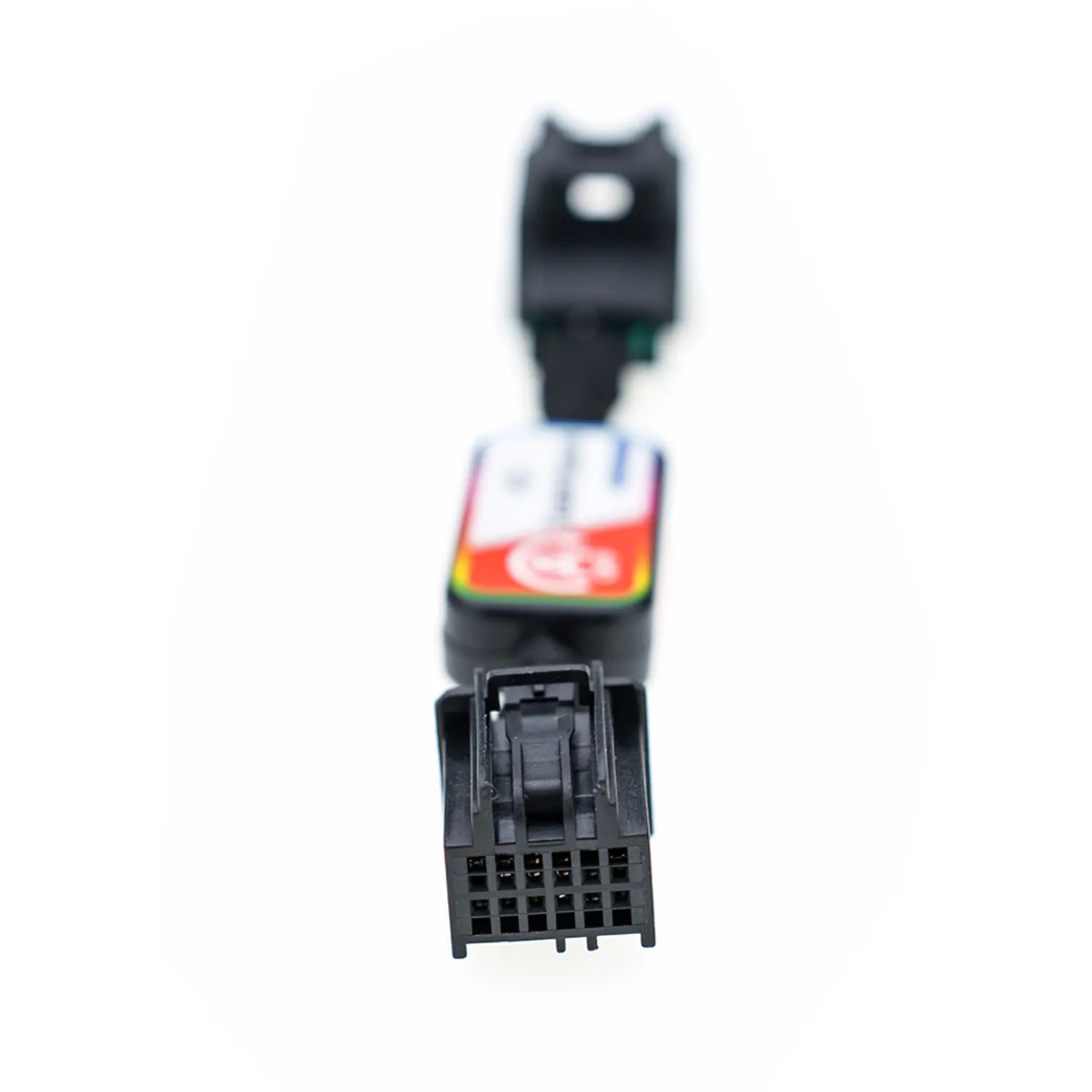 A black automotive bypass module labeled