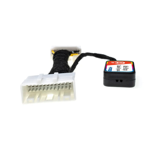 Idle Stop Disable Bypass device featuring a compact control module and two white multi-pin connectors, designed to deactivate a vehicle’s automatic engine stop-start system.