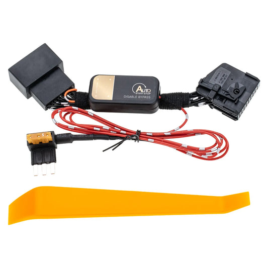A black auto start-stop disable bypass module with gold label, black connectors, red/black wires and a fuse tap. An orange removal tool is included in the package.