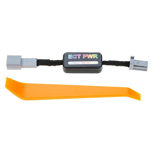 Automotive ECT PWR default ON module with black casing and gray connectors, shown alongside an orange plastic trim removal tool, both placed on a plain white background.