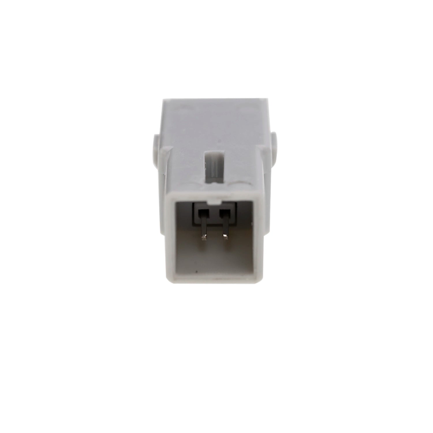 A gray plastic object, featuring a rectangular shape and a slot-like opening, shows its interior with a two-pin connector.