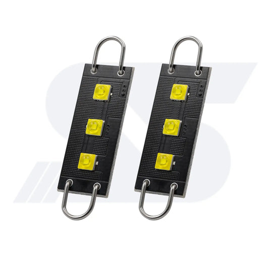 Pair of compact LED light modules featuring three bright yellow LEDs each, mounted on black rectangular boards with metal loops for easy attachment or suspension.
