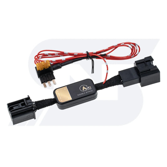 A black auto disable bypass module with connectors, featurs a red wire and a yellow fuse tap and it is labeled "Auto Disable Bypass" .