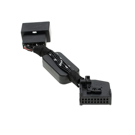 An automotive bypass module features a square 18-pin female connector on one end and a multi-wire plug on the other. 