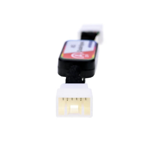 A rectangular ASS Disable Bypass module with colorful labeling, featuring two connectors  and a toggle switch marked "OFF" for disabling vehicle systems. There is a white 6-pin male connector on one end.