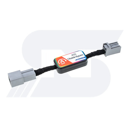 A black ASS Disable Bypass device with "A OFF" and "First Choice" labels, featuring gray connectors on both ends, used for automotive applications.