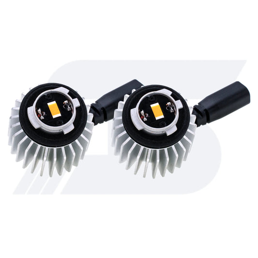 A pair of LY5B LED turn signal light modules are made of aluminum heat sinks and a black connector wire.